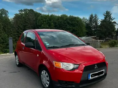 Gebraucht Mitsubishi Colt 74 PS (54 kW) 2009 Rot Kleinwagen