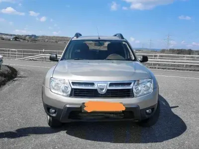 Używany Dacia Duster 90 KM (66 kW) 2012 Złoty SUV
