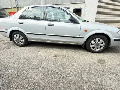 Gebraucht Mazda 323 Comfort 73 PS (53 kW) 2000 Silber Limousine