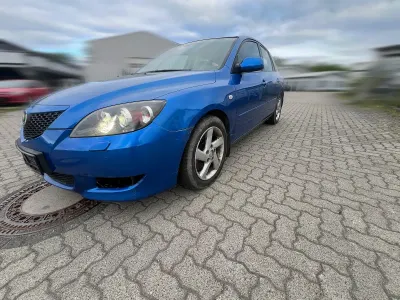 Używany Mazda 3 105 KM (77 kW) 2005 Niebieski Hatchback