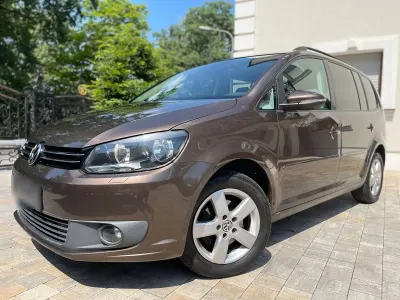 Gebraucht VW Touran Comfortline 105 PS (77 kW) 2011 Braun Van / Kleinbus