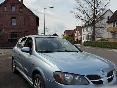 Second-hand Nissan Almera 90 CP (66 kW) 2005 Albastru Hatchback