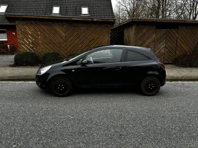 Używany Opel Corsa 90 KM (66 kW) 2009 Czarny Hatchback