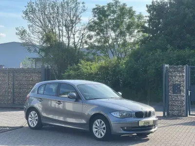 Gebraucht BMW 116 122 PS (89 kW) 2011 Grau Kleinwagen