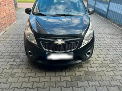 Gebraucht Chevrolet Spark 82 PS (60 kW) 2011 Schwarz Kleinwagen