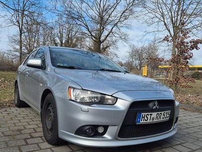 Second-hand Mitsubishi Lancer Invite 117 CP (86 kW) 2010 Argintiu Berlinǎ