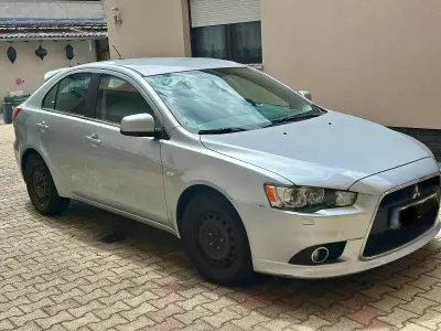 Gebraucht Mitsubishi Lancer 117 PS (86 kW) 2011 Silber Limousine