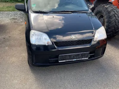 Gebraucht Daihatsu Cuore 69 PS (50 kW) 2007 Schwarz Kleinwagen