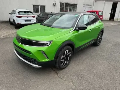 Gebraucht Opel Mokka Elegance 131 PS (96 kW) 2023 Matcha green/ikone gruen SUV