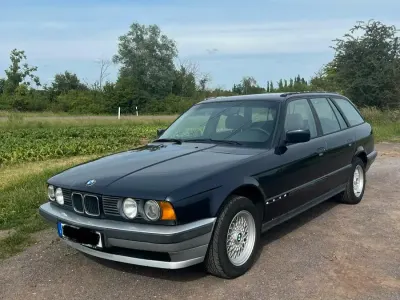 Gebraucht BMW 518 113 PS (83 kW) 1994 Blau Kombi