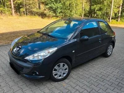 Gebraucht Peugeot 206+ 75 PS (55 kW) 2010 Grau Kleinwagen