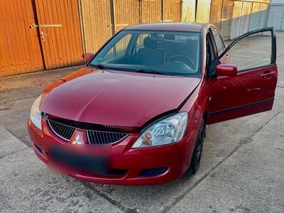 Gebraucht Mitsubishi Lancer 100 PS (73 kW) 2004 Rot Limousine