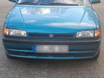 Second-hand Mazda 323 75 CP (55 kW) 1994 Verde Hatchback
