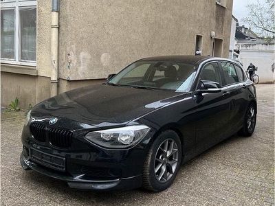 Second-hand BMW 114 Sport Line 105 CP (77 kW) 2013 Negru Hatchback