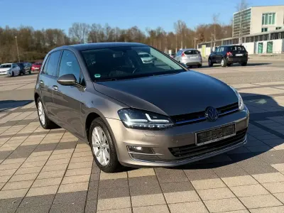 Gebraucht VW Golf VII LOUNGE 125 PS (91 kW) 2015 Limestone grey metallic Kleinwagen