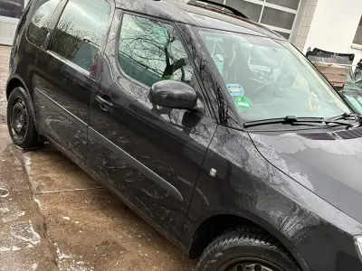 Second-hand Skoda Roomster 90 CP (66 kW) 2014 Negru Monovolum