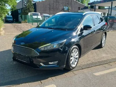Gebraucht Ford Focus Titanium 125 PS (91 kW) 2016 Iridiumschwarz metallic Kombi