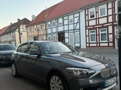 Używany BMW 116 Urban Line 136 KM (100 kW) 2011 Szary Hatchback