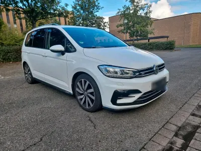Używany VW Touran R-line 150 KM (110 kW) 2017 Biały Minivan