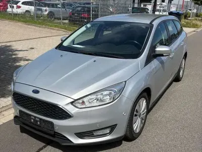 Gebraucht Ford Focus 101 PS (74 kW) 2015 Polarsilber metallic Kombi