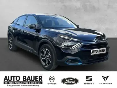Używany Citroën e-C4 Feel 100 kW (136 KM) 2022 Czarny Sedan/Limuzyna
