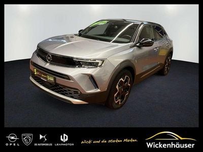 Gebraucht Opel Mokka-e Ultimate 100 kW (136 PS) 2022 Kontrast grau/quarz silber SUV