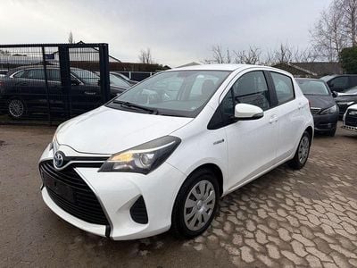 Gebraucht Toyota Yaris Hybrid 75 PS (55 kW) 2014 Weiß Limousine