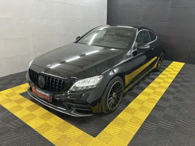 Gebraucht Mercedes C300 AMG line 259 PS (190 kW) 2022 Obsidianschwarz  metalliclack Coupé