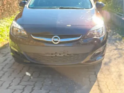 Używany Opel Astra Sport 115 KM (84 kW) 2014 Brązowy Kombi