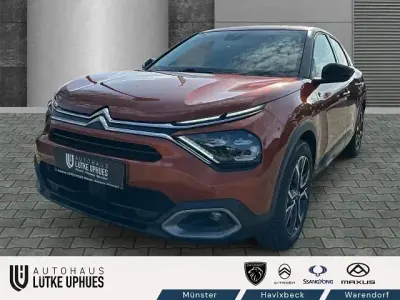 Używany Citroën e-C4 Shine 100 kW (136 KM) 2022 Pomarańczowy Sedan/Limuzyna