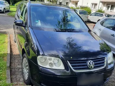 Używany VW Touran 140 KM (102 kW) 2003 Czarny Minivan