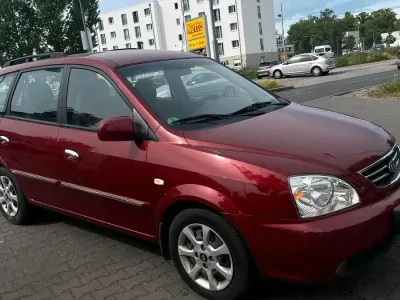 Gebraucht Kia Carens 140 PS (102 kW) 2004 Rot Van / Kleinbus