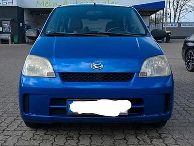 Second-hand Daihatsu Cuore Plus 58 CP (42 kW) 2003 Albastru Hatchback