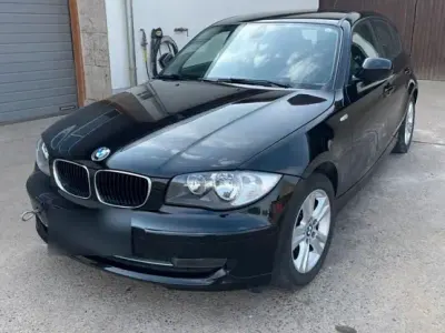 Gebraucht BMW 118 143 PS (105 kW) 2010 Schwarz Kleinwagen