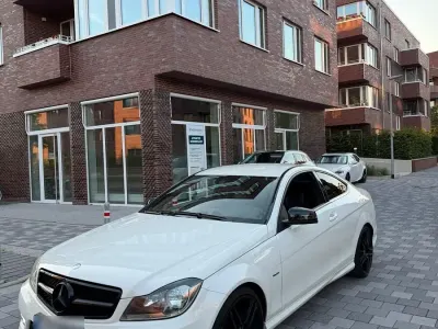 Gebraucht Mercedes C180 AMG 200 PS (147 kW) 2012 Weiß Coupé