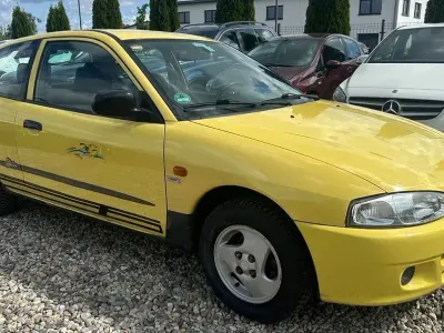 Gebraucht Mitsubishi Colt 75 PS (55 kW) 1998 Gelb Kleinwagen