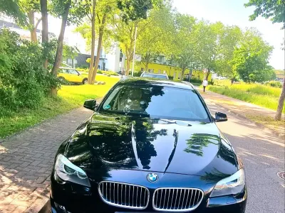 Gebraucht BMW 520 184 PS (135 kW) 2011 Schwarz Kombi