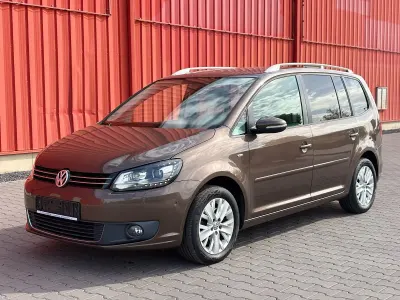 Gebraucht VW Touran Life 140 PS (102 kW) 2013 Braun Van / Kleinbus