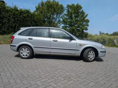 Gebraucht Mazda 323F 88 PS (64 kW) 1999 Silber Kombi