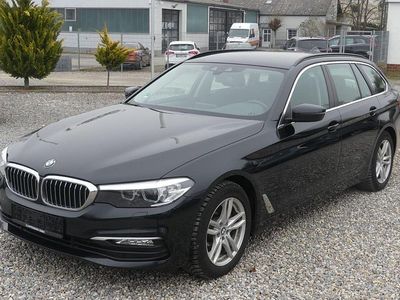 Gebraucht BMW 520 Performance 190 PS (139 kW) 2017 Black sapphire metallic Kombi