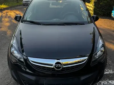 Gebraucht Opel Corsa Active 69 PS (50 kW) 2013 Schwarz Kleinwagen