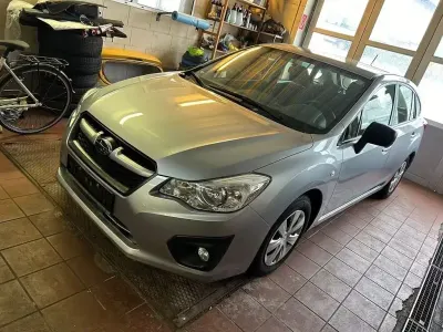 Second-hand Subaru Impreza Comfort 114 CP (83 kW) 2013 Argintiu Berlinǎ