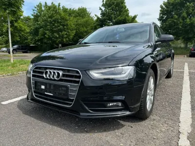 Używany Audi A4 Attraction 170 KM (125 kW) 2013 Czarny Kombi