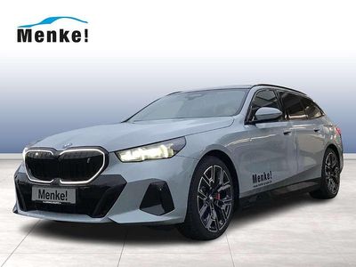 Grau Gebraucht 2025 BMW i5 M Sport Kombi | 89.999 €