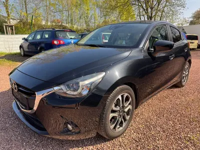 Używany Mazda 2 Edition 116 KM (85 kW) 2015 Czarny Sedan/Limuzyna