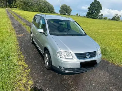 Używany VW Touran 136 KM (100 kW) 2003 Srebrny Minivan