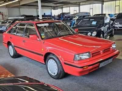 Gebraucht Nissan Bluebird 105 PS (77 kW) 1990 Rot Limousine
