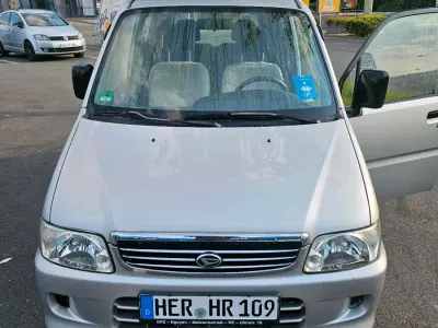 Gebraucht Daihatsu Move 55 PS (40 kW) 2012 Silber Van / Kleinbus