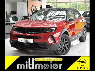 Gebraucht Opel Mokka-e 100 kW (136 PS) 2024 Rot kosmos rot met. SUV