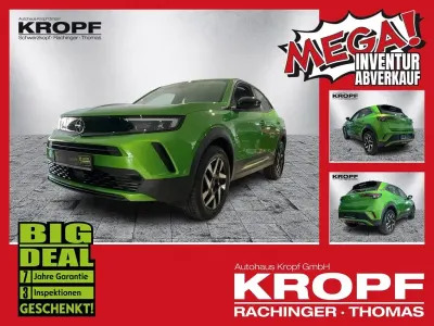 Gebraucht Opel Mokka Elegance 131 PS (96 kW) 2024 Lackierung matcha green/typ au SUV